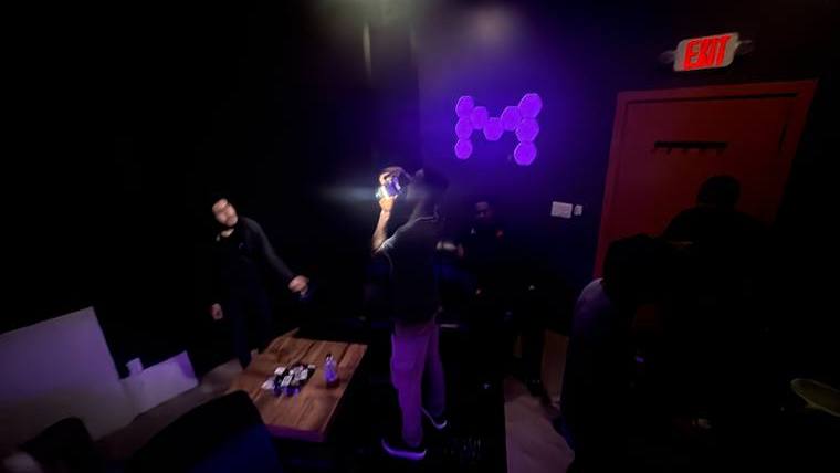 Session in the purple-lit room