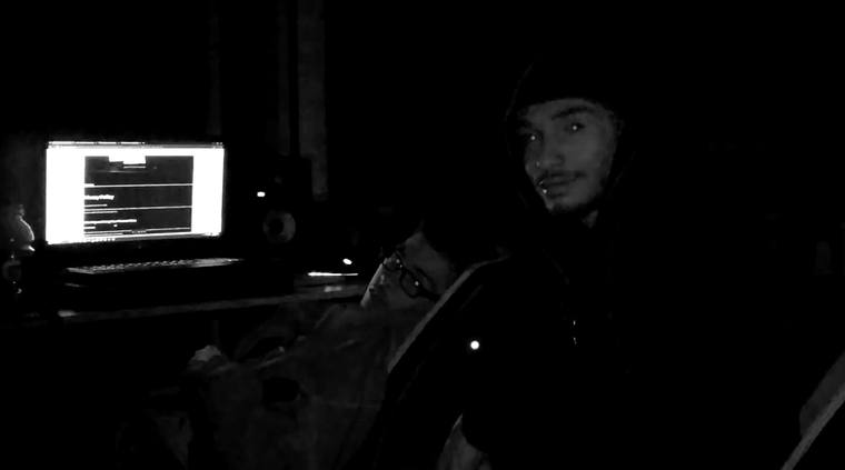Two heads at the screen